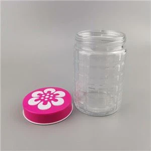 پلاسٹک کی ٹوپی کے ساتھ شیشے کا جار